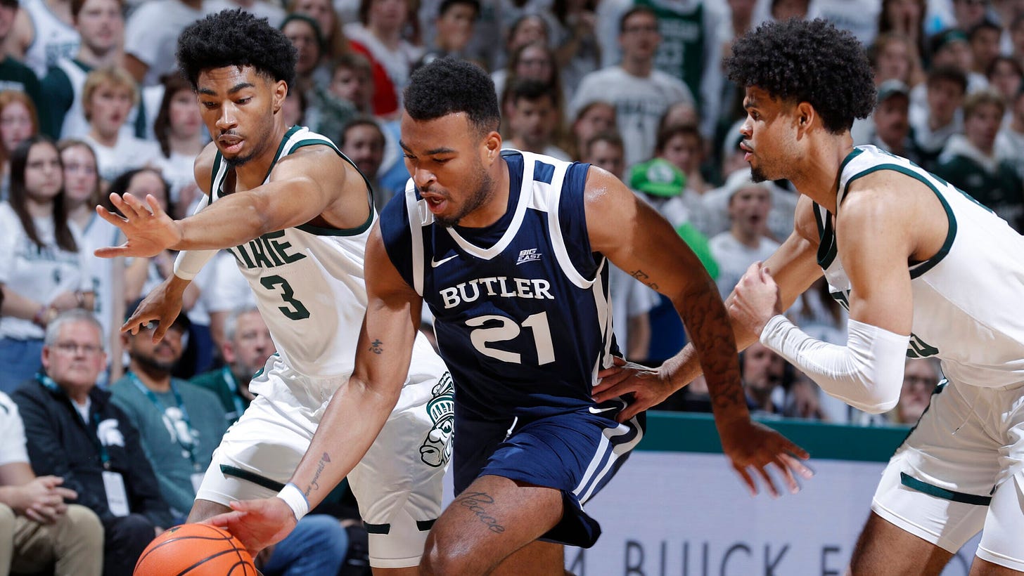 Walker leads No. 18 Michigan State to a 74-54 win over Butler