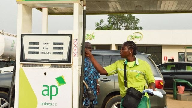 An attendant sells diesel to a motorist at a filling station at Warewa, along Lagos-Ibadan expressway, Ogun State, south-west Nigeria - March 2022