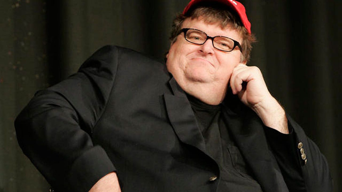 Michael Moore Says He Made $20K Available for Julian Assange's Bail ...