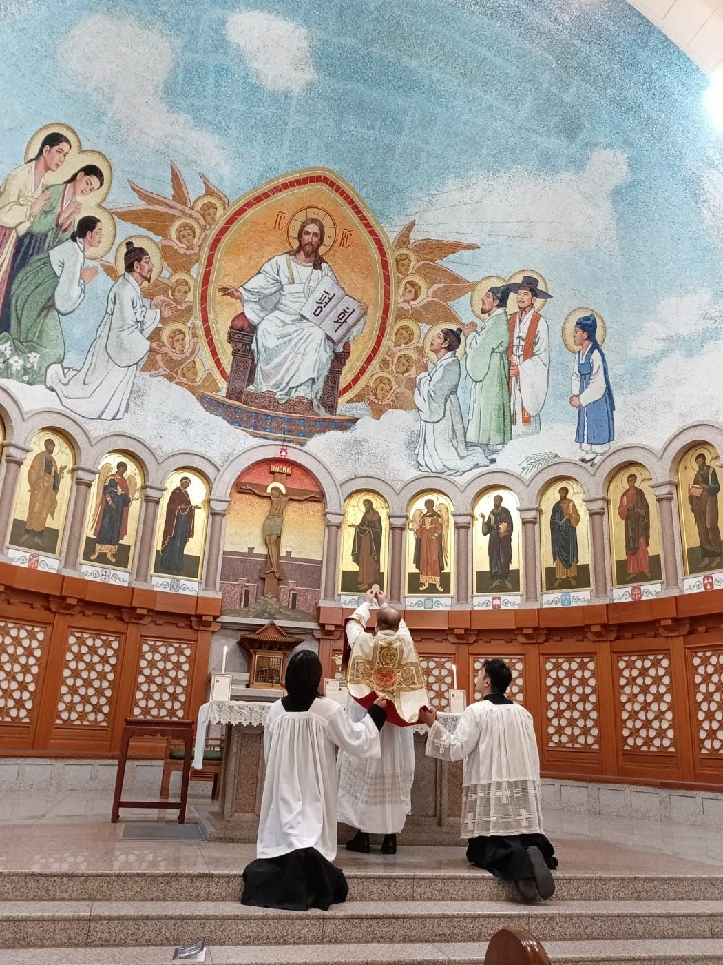 May be an image of 3 people, the Basilica of the National Shrine of the Immaculate Conception and text