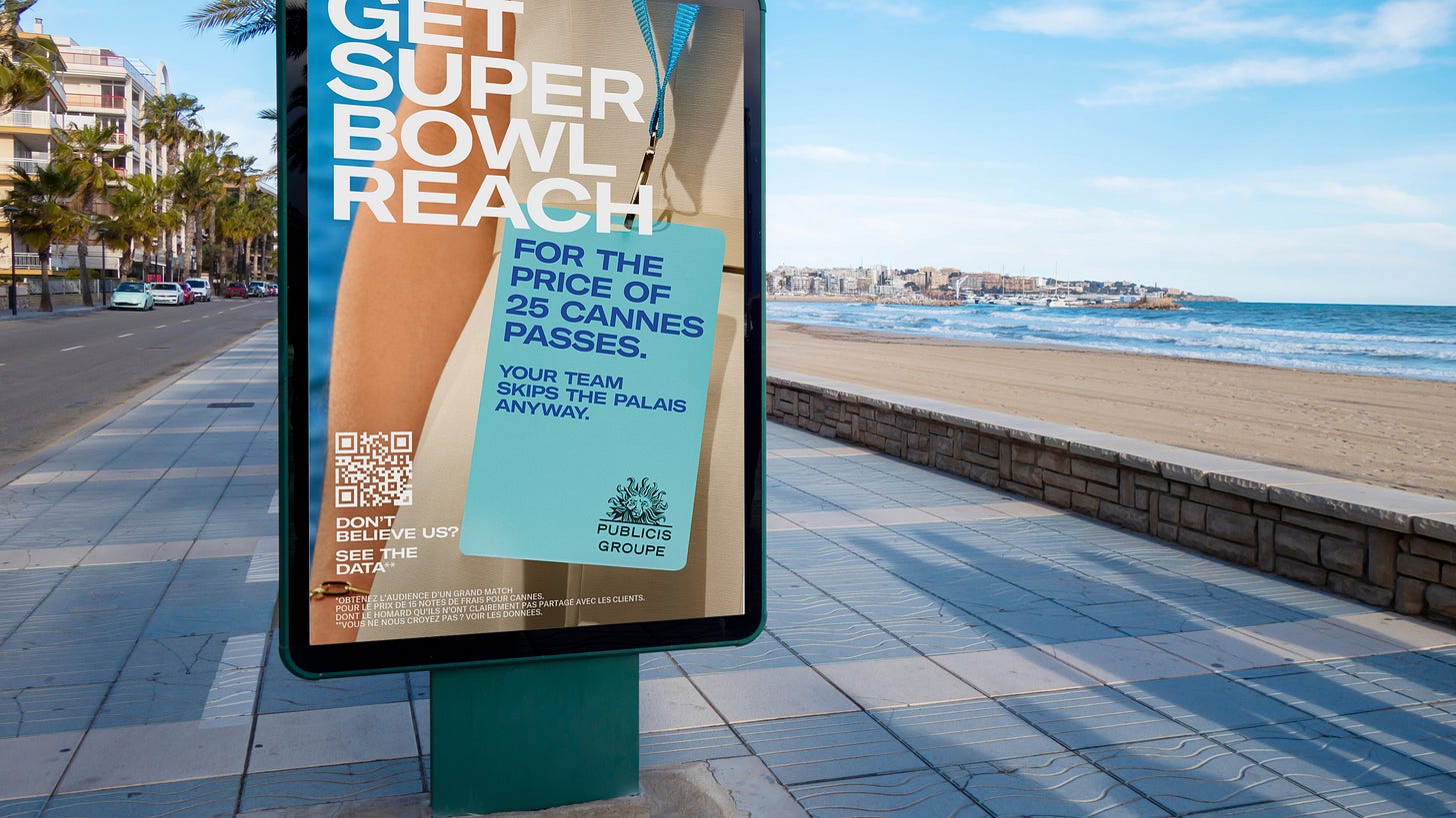 A digital OOH display at Cannes Lions, saying "Get Super Bowl Reach for the cost of 25 Cannes passes. Your team skips the Palais anyway."