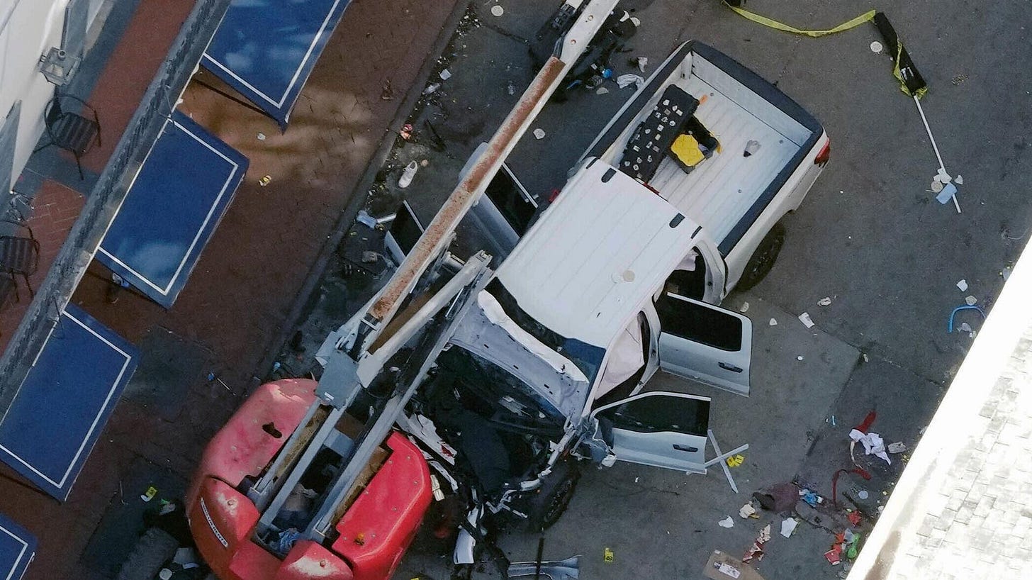 A black flag with white lettering lies on the ground rolled up behind a pickup truck that a man drove into a crowd on Bourbon Street in New Orleans, killing and injuring a number of people, early Wednesday morning, Jan. 1, 2025. - Sputnik International, 1920, 02.01.2025