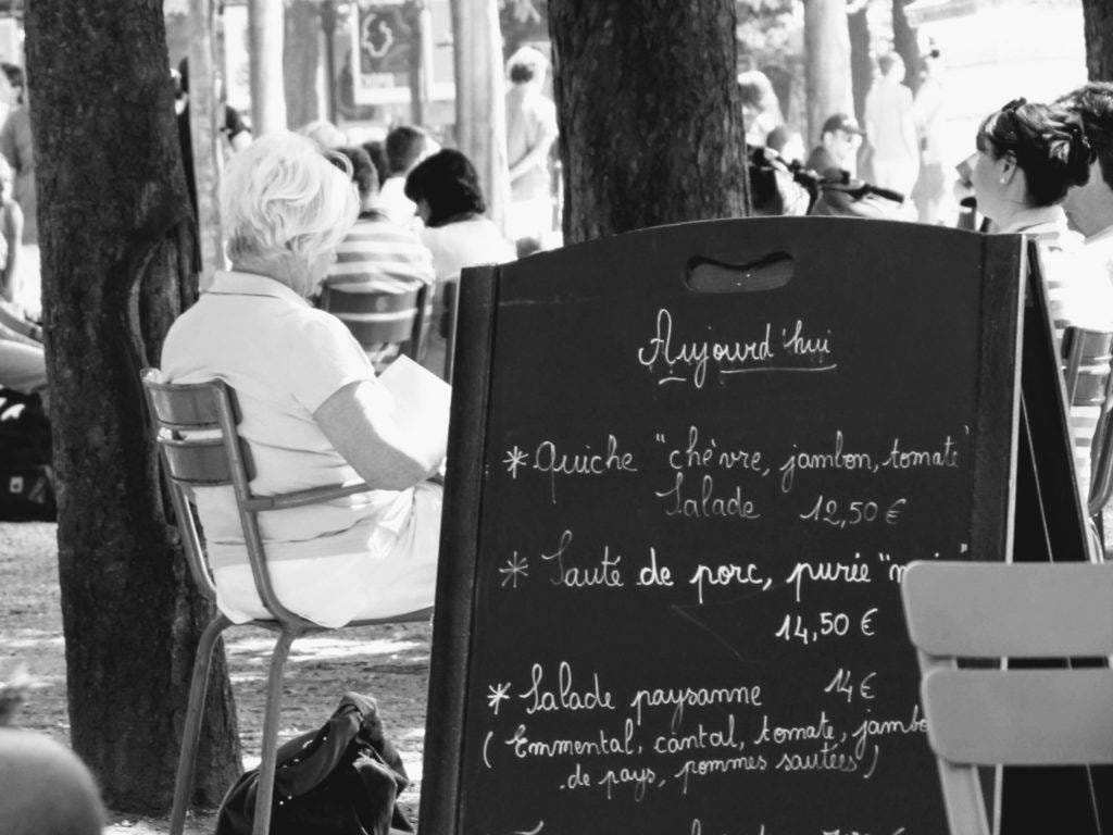 A chalk board lists the day's menu in Paris. Why do I travel? To sample as much of the world's food and drink as I can.