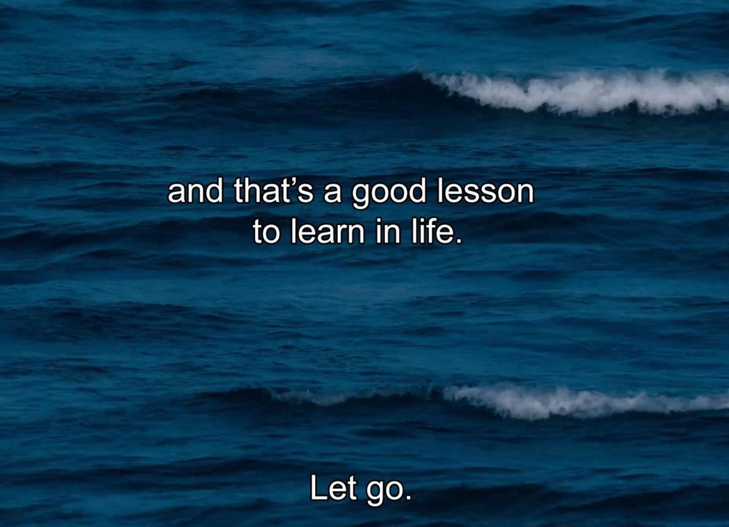 A screenshot from the film Liv and Ingmar, showing deep blue ocean waves with the subtitle “And that's a good lesson to learn in life. Let go.”