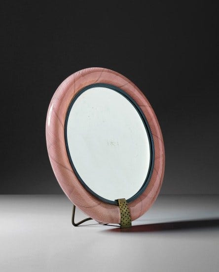 smokingdoor:
“Carlo Scarpa, ‘Table mirror, model no. 7′, circa 1937.
Mezza filigrana glass, mirrored glass, brass.
Image courtesy of Phillips.
”