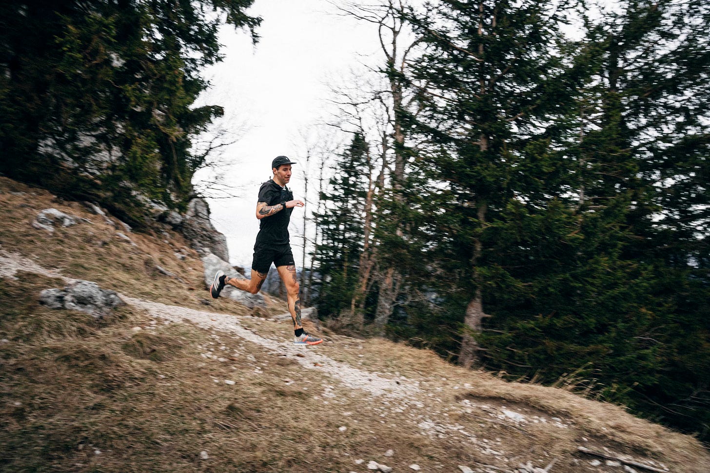 The author running along a narrow trail