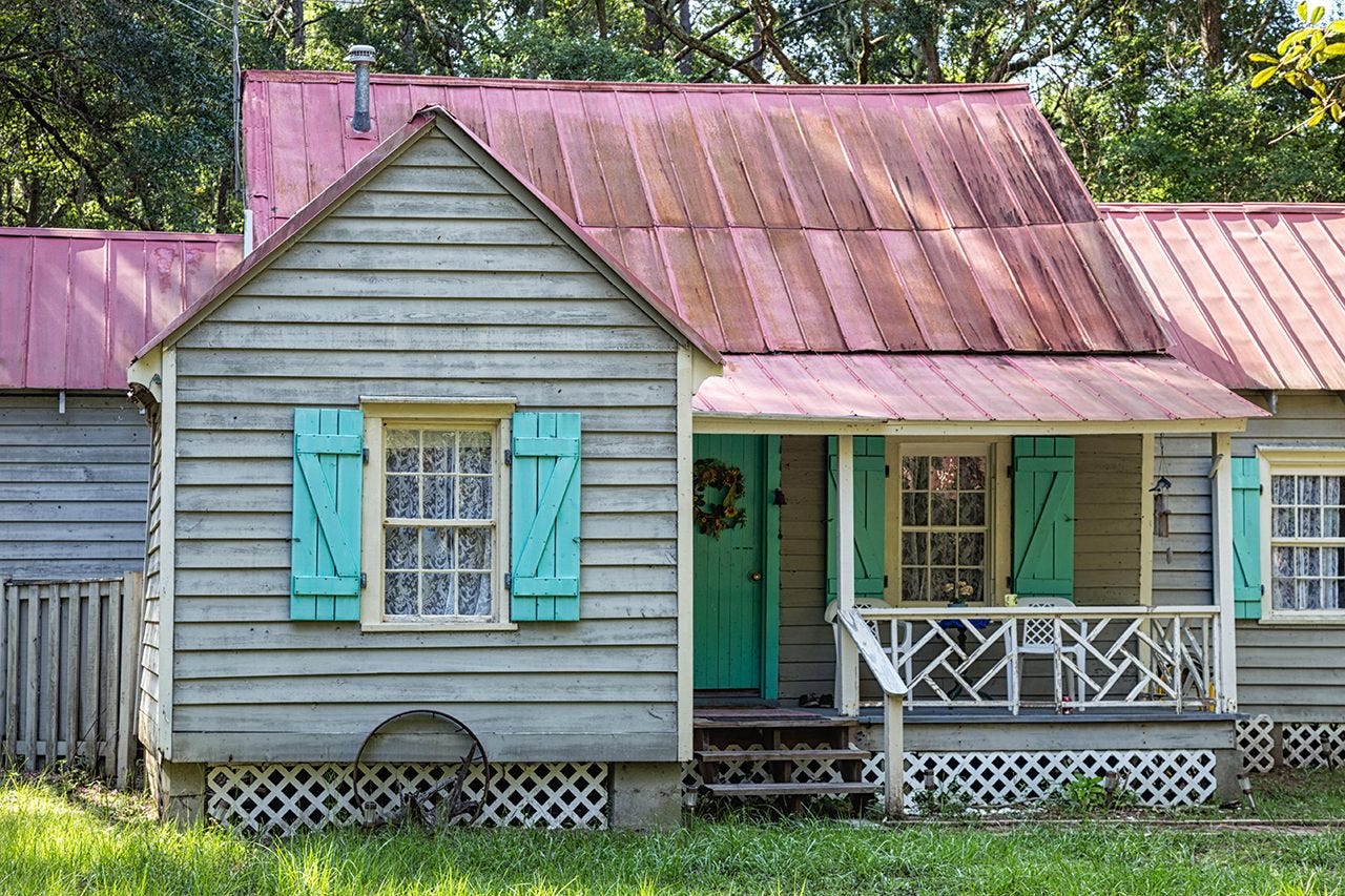 At this Gullah Geechee home on Daufuskie Island, South Carolina, painted doors and shutters keep out evil spirits called "haints." 
