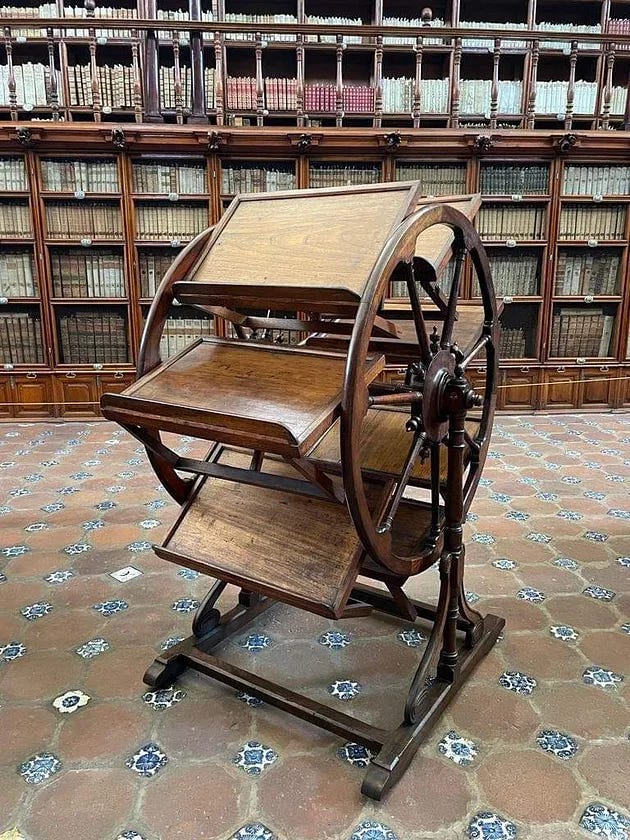 This is a bookwheel. A magnificent 300-year-old library tool that enabled researchers to have seven books open at once.
