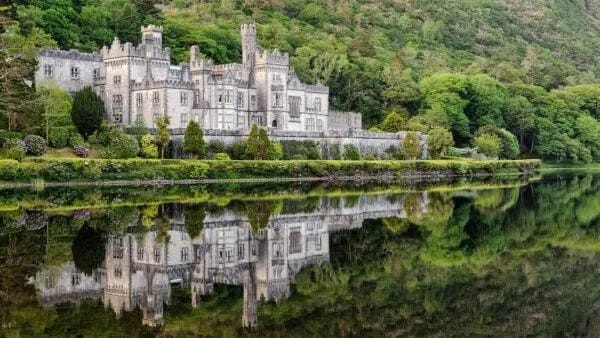 The secret and tragic love story that led to the magnificent Kylemore Abbey.