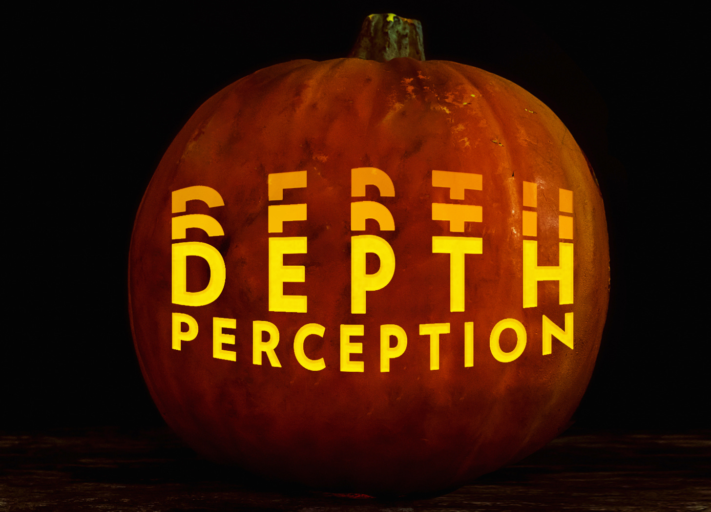 A photo illustration of a pumpkin on a black background with a glowing orange "DEPTH PERCEPTION" logo carved in it.