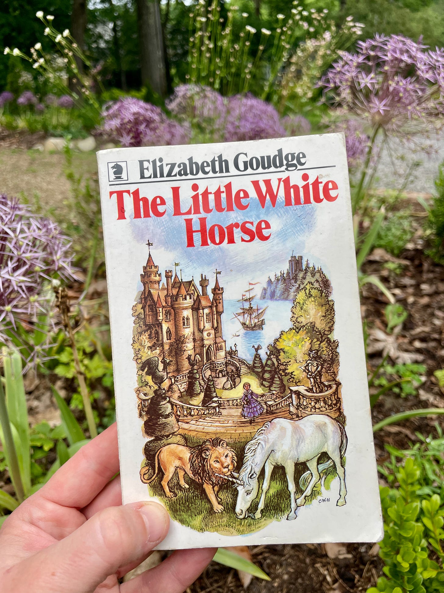 The colorful cover of the Knight Books edition of The Little White Horse by Elizabeth Goudge