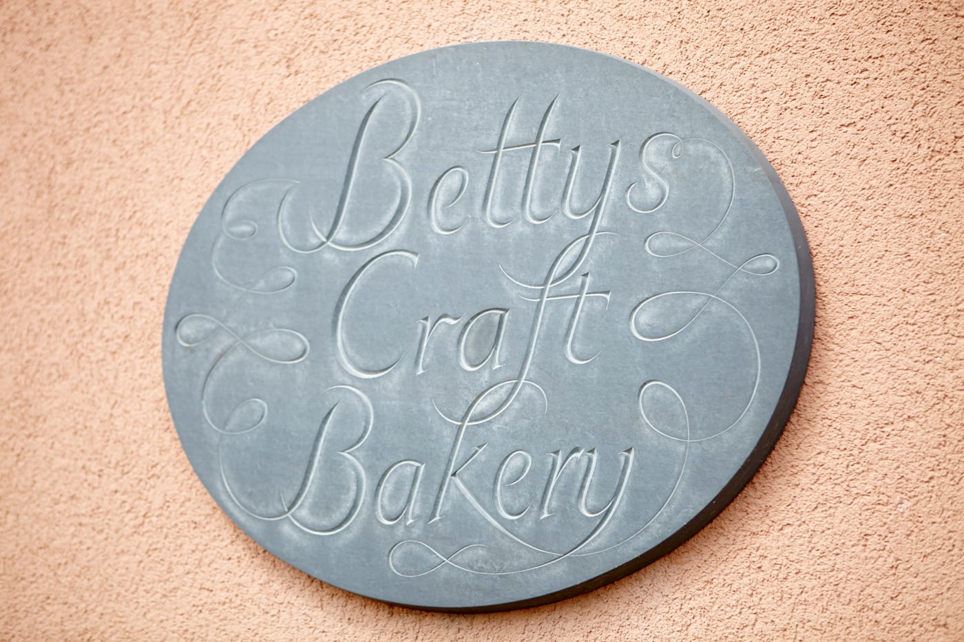 Bettys Craft Bakery Sign on a wall