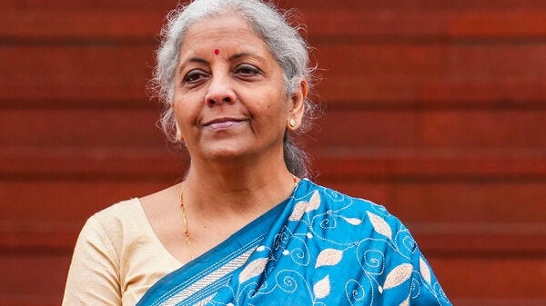 Union Finance Minister Nirmala Sitharaman, carrying a folder-case containing the Interim Budget 2024, arrives at Parliament House complex to present the budget. (PTI Photo)