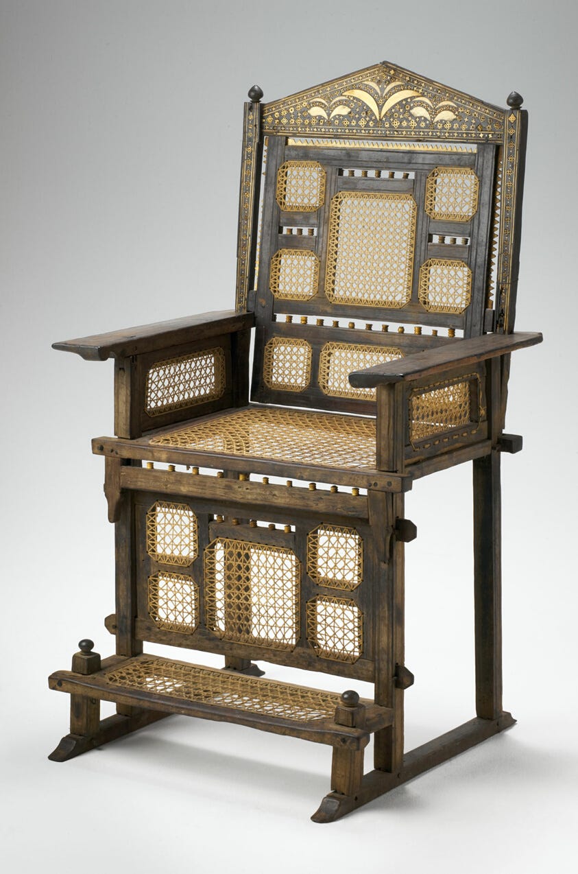 Kita Cha Enzi, a high-backed seat with bone and ivory inlay.