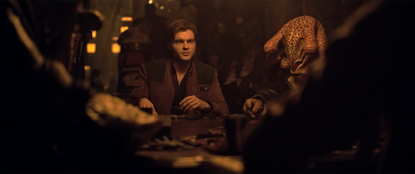 r/MovieDetails - Alden Ehrenreich sitting at a table with a leopard head