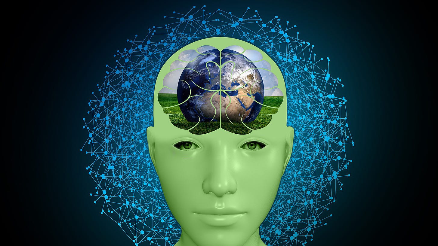 uma cabeça com o cerebro mostrando um planeta terra em cima de um campo verde