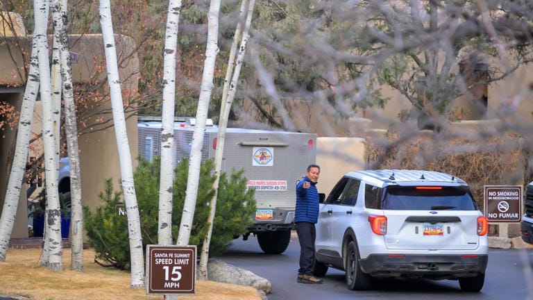 Santa Fe County Sheriff deputies arrive Thursday at the Santa Fe Summit gated community where actor Gene Hackman and his wife Betsy Arakawa were found dead. - Roberto E. Rosales/AP