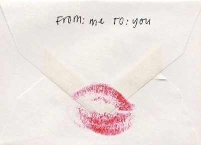 This may contain: an envelope with a red lipstick imprint on it and the words, from me to you This may contain: an envelope with a red lipstick imprint on it and the words, from me to you