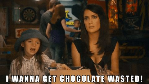 A child saying "I wanna get chocolate wasted" while Salma Hayek looks concerned.