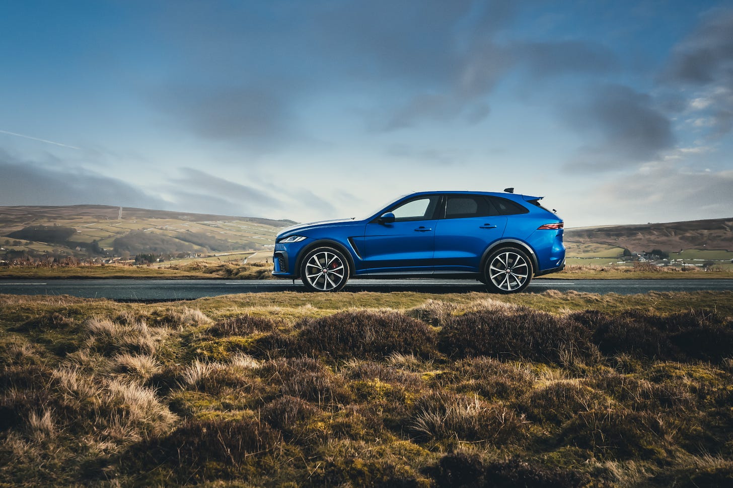 Side view of Jaguar F-Pace SVR in Velocity Blue