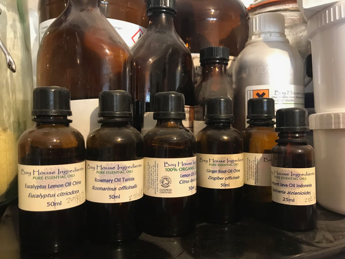 A selection of brown bottles containing essential oils