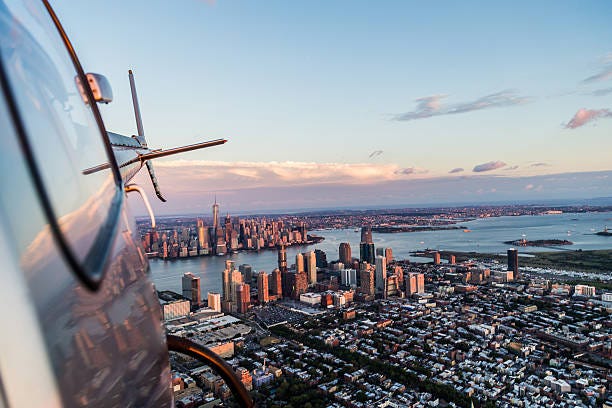 Flying High And Looking Back Stock Photo - Download Image Now - Helicopter,  New York City, Riding - iStock