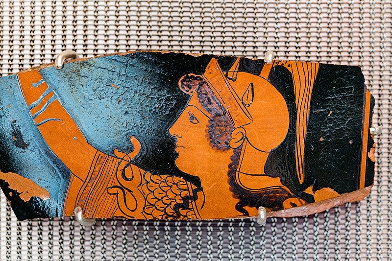 color photograph of a vase fragment showing the head of Athena