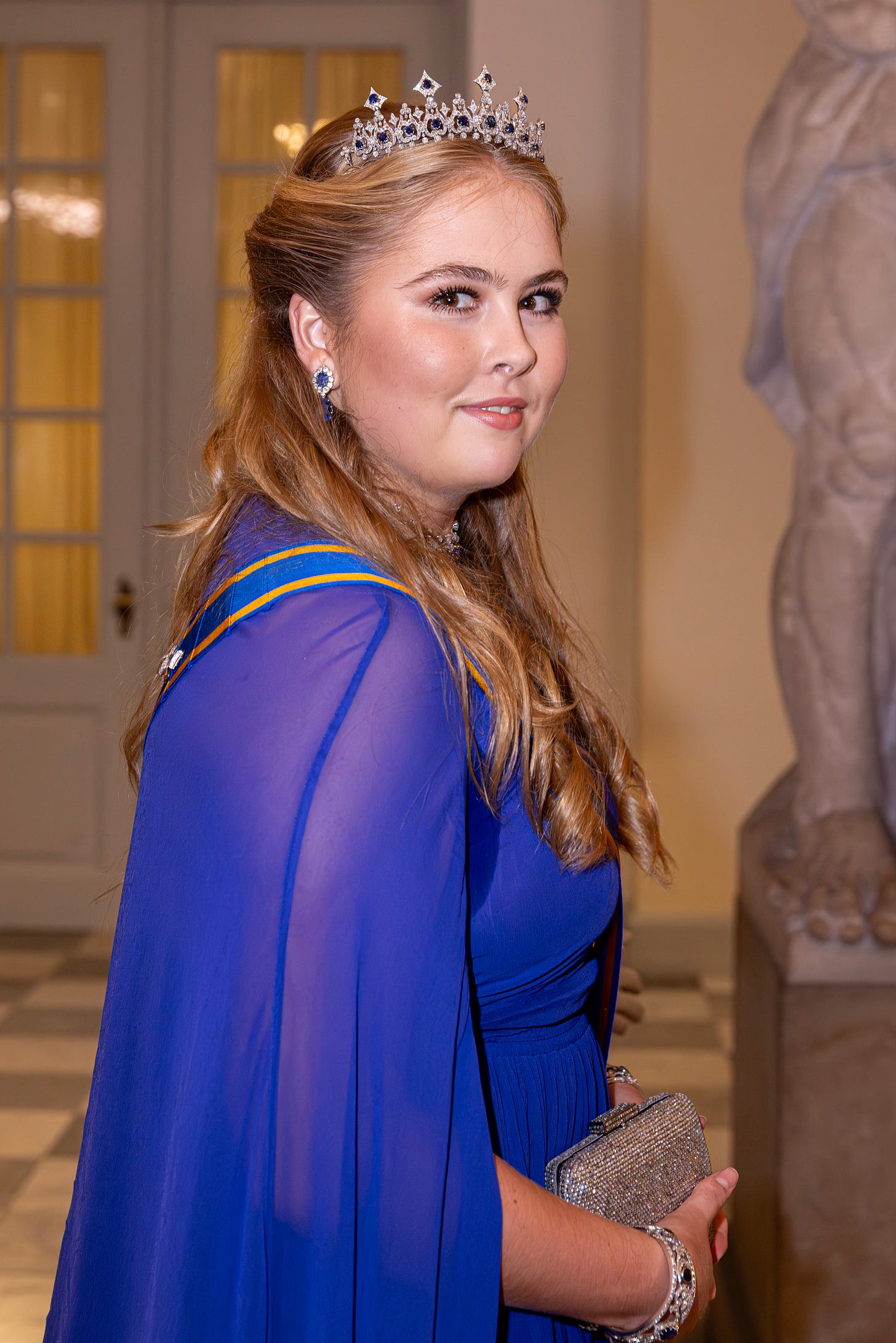 Princess Catharina-Amalia wearing blue dress and tiara