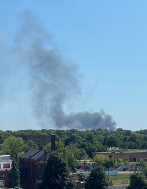 Smoke from a Rosemary Boulevard fire is seen Thursday, Sept. 5, from downtown Akron.