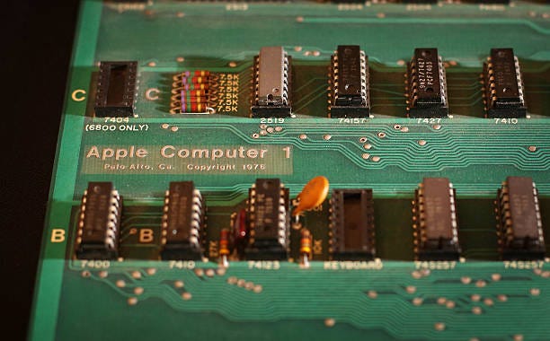 An Apple-1 Personal Computer is displayed at Christie's on October 9, 2012 in London, England. Introduced in July 1976 the Apple-1 was sold without a...