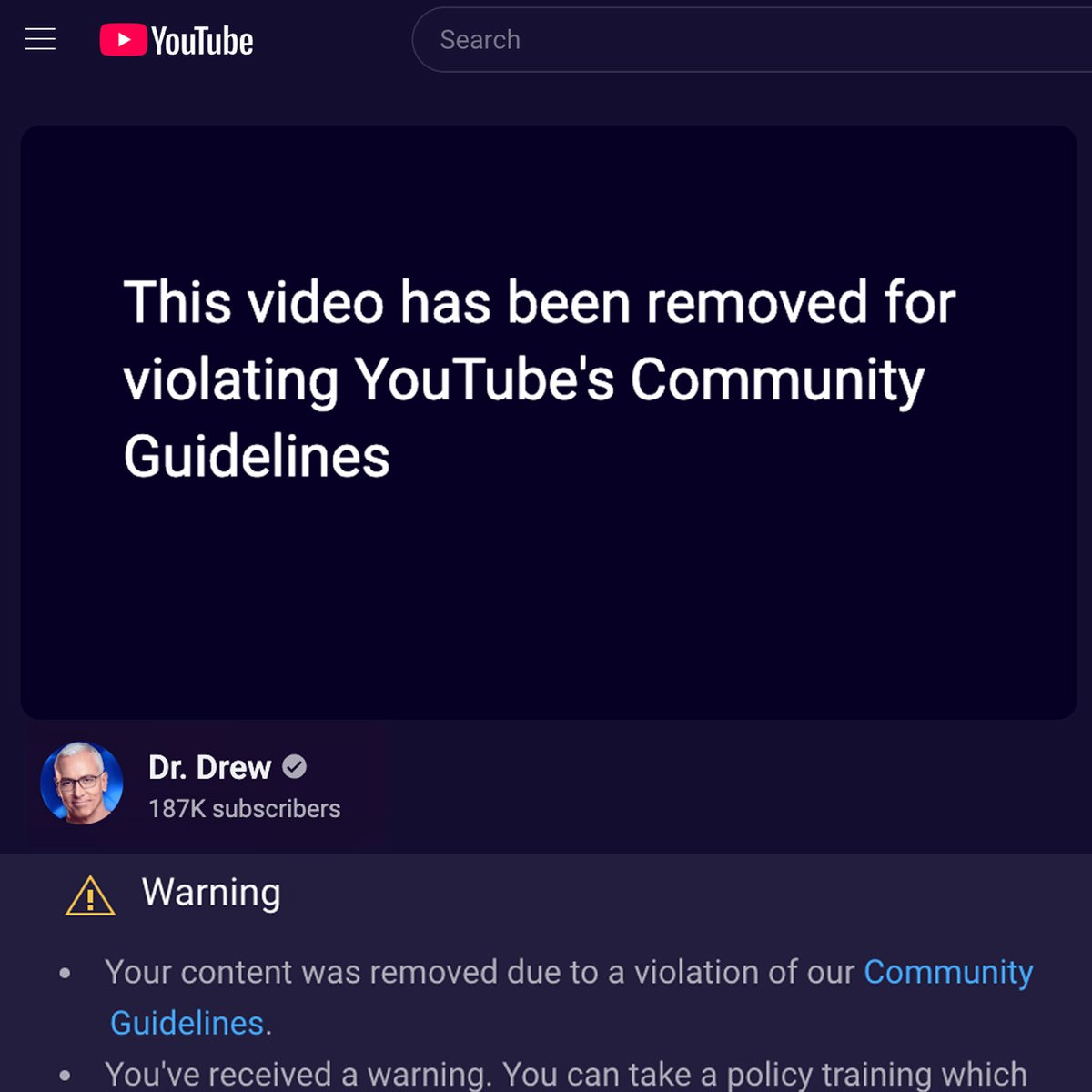 A screenshot of a YouTube video that has been removed by the platform from the Dr. Drew channel, and replaced by words that read "This video has been removed for violating YouTube's Community Guidelines"