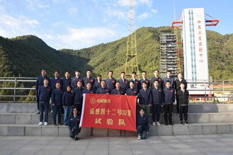 Part of SAST's team near overlooking both Launch Complex 2 & 3 at the Xichang Satellite Launch Center.