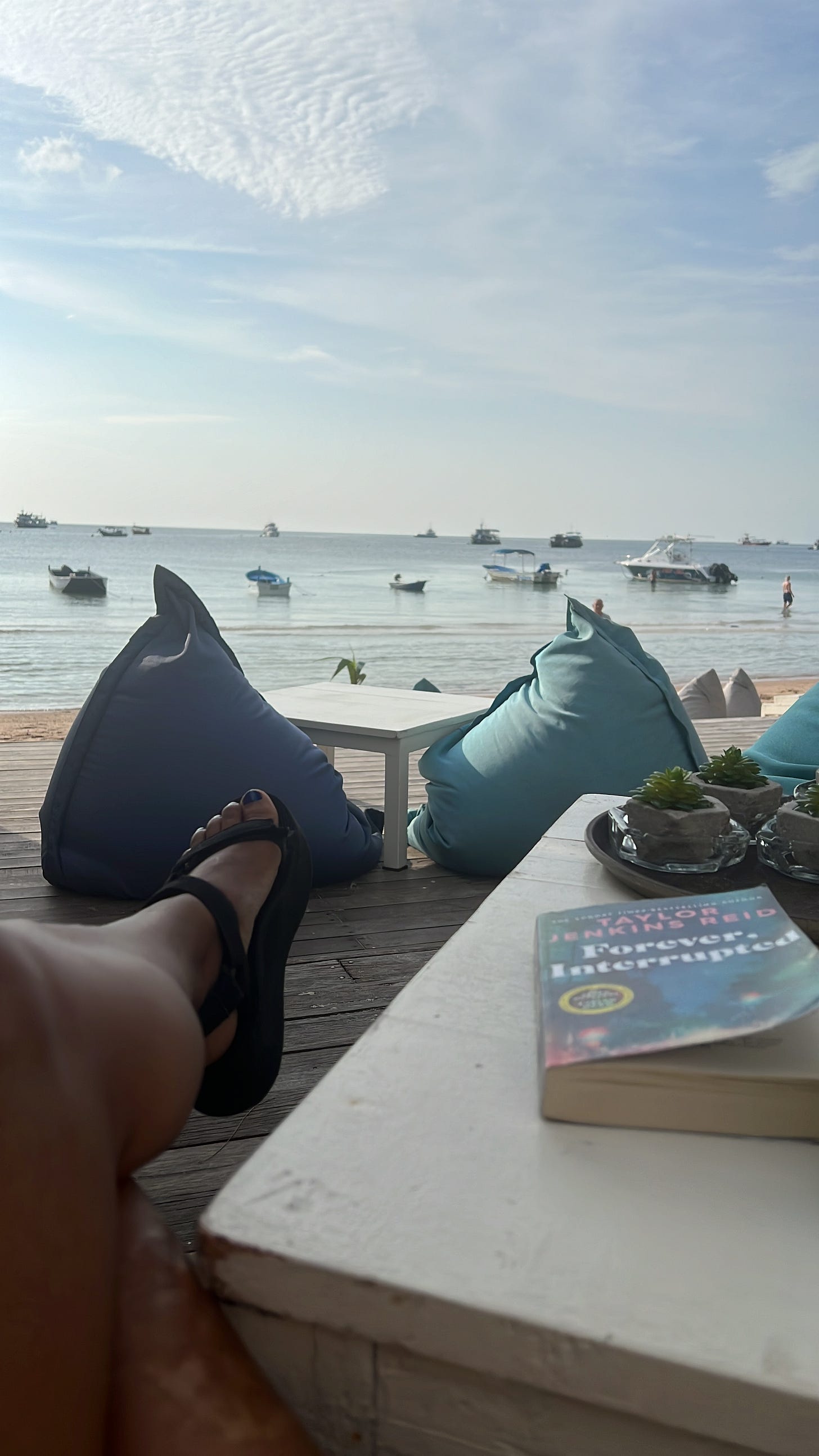 Natalie Lue chilling at a beach cafe on Sairee Beach in Thailand