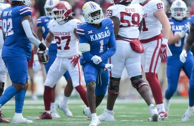 Kansas safety Kenny Logan Jr. (1) reacts after making a tackle against Oklahoma in the first quarter of their game at David Booth Kansas Memorial Stadium.