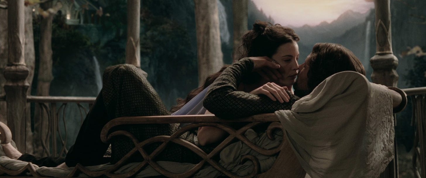 Arwen and Aragorn embracing