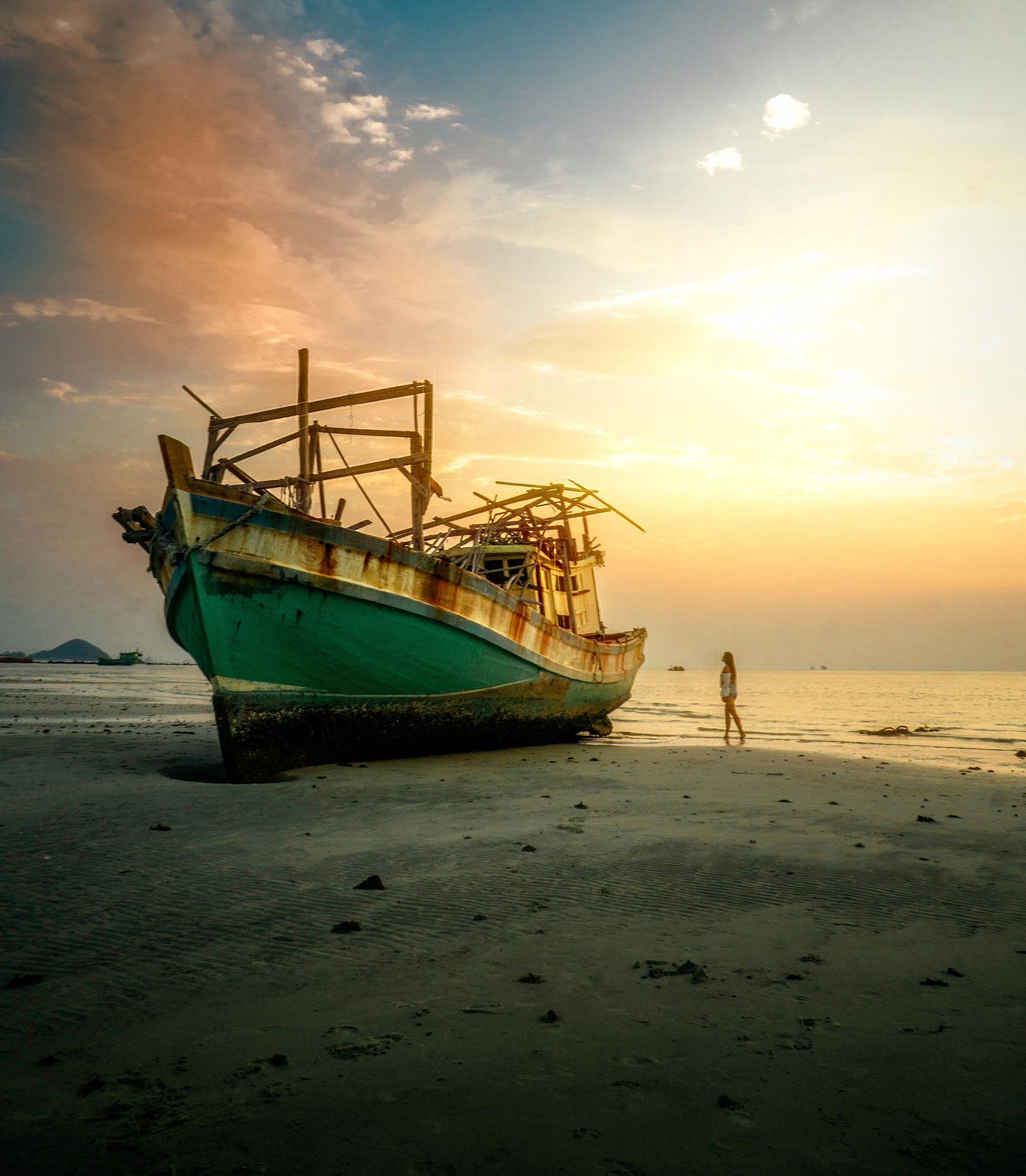 Photo of beached ship by Serinus from Pexels