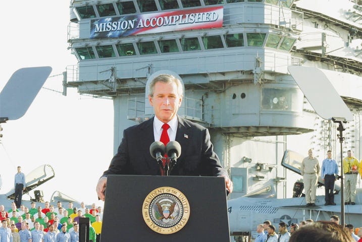 IN this May 2, 2003 file photo, US president George W. Bush declares the end of major combat in Iraq as he speaks aboard the aircraft carrier USS Abraham Lincoln under a giant “Mission Accomplished” banner and announces that “major combat operations in Iraq have ended”, just six weeks after the invasion. But the war dragged on for many years after that.—AP