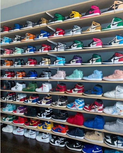 Rack showing dozens of Nike Air Jordan 1 models in different colors