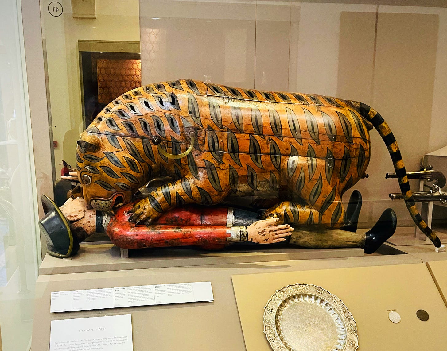 'Tippoo's Tiger' at the V&A museum: a wooden tiger eating a wooden man