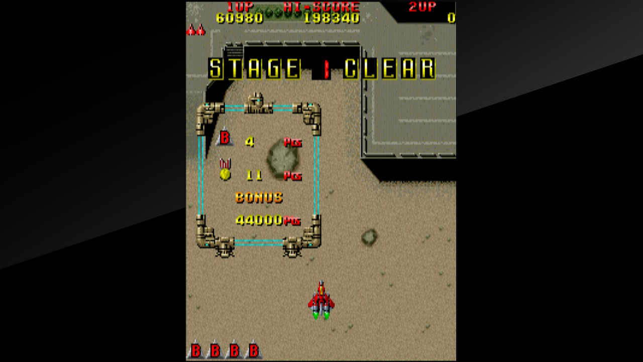 A screenshot of the Stage 1 Clear screen from the Arcade Archives version of Raiden. No bombs were used, so there are four remaining in stock, and 11 medals were collected. You receive 1,000 points for each medal, multiplied by the number of bombs remaining, so, 44,000 points in this instance. Prior to this bonus, Stage 1 had been worth just under 61,000 points, so that's no small thing.
