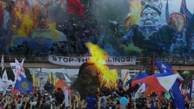 Group, artist respond to criminal raps filed over burning of Marcos' effigy