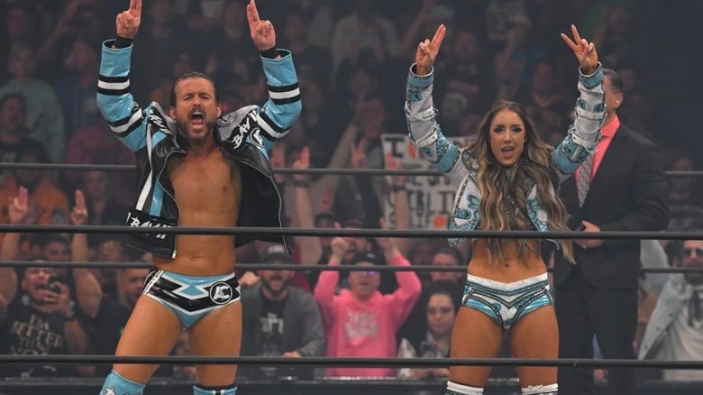 Adam Cole and Britt Baker strike a pose