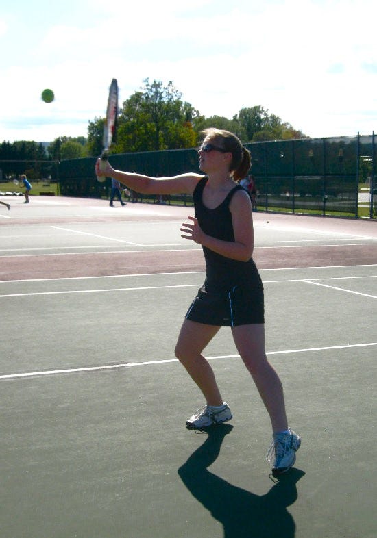 Girl playing tennis
