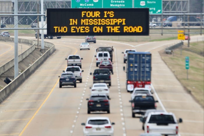 A Mississippi roadside safety sign that says: "Four I's in Mississippi, two eyes on the road."