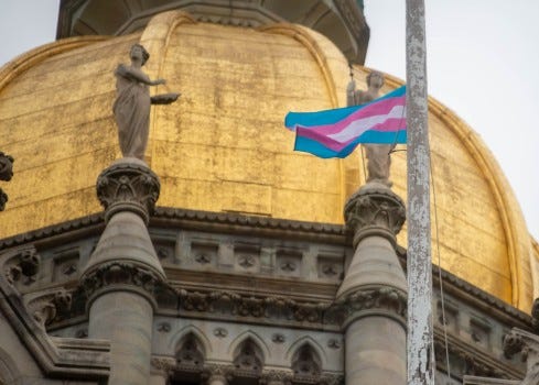 ATrasngender Flag flies at the Connecticut State Capitol to recognize International Transgender Day of Visibility in Connecticut on March 31, 2023. (Aaron Flaum/Hartford Courant)