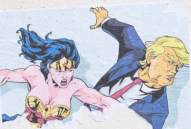 Wonder woman hits Trump across the face.