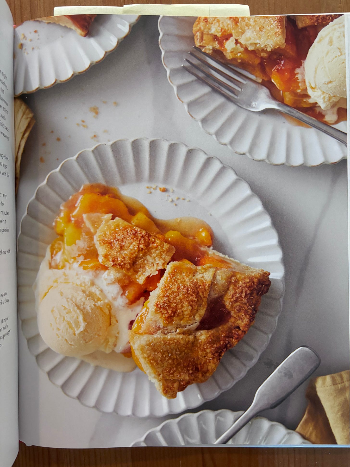 slice of peach pie on a page in cookbook