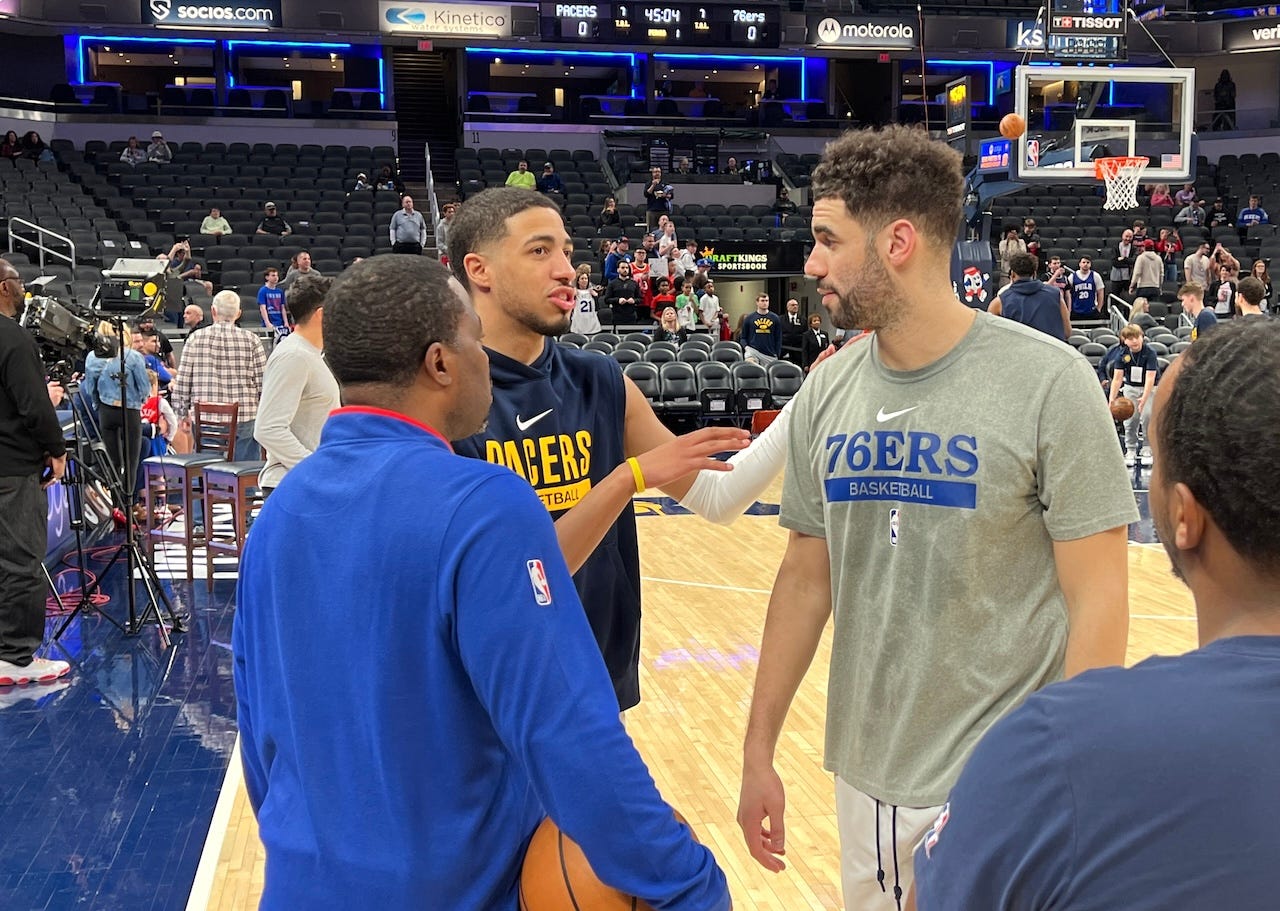 Tyrese Haliburton and Georges Niang before a game late last season.