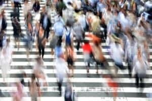 people bussy crossing street