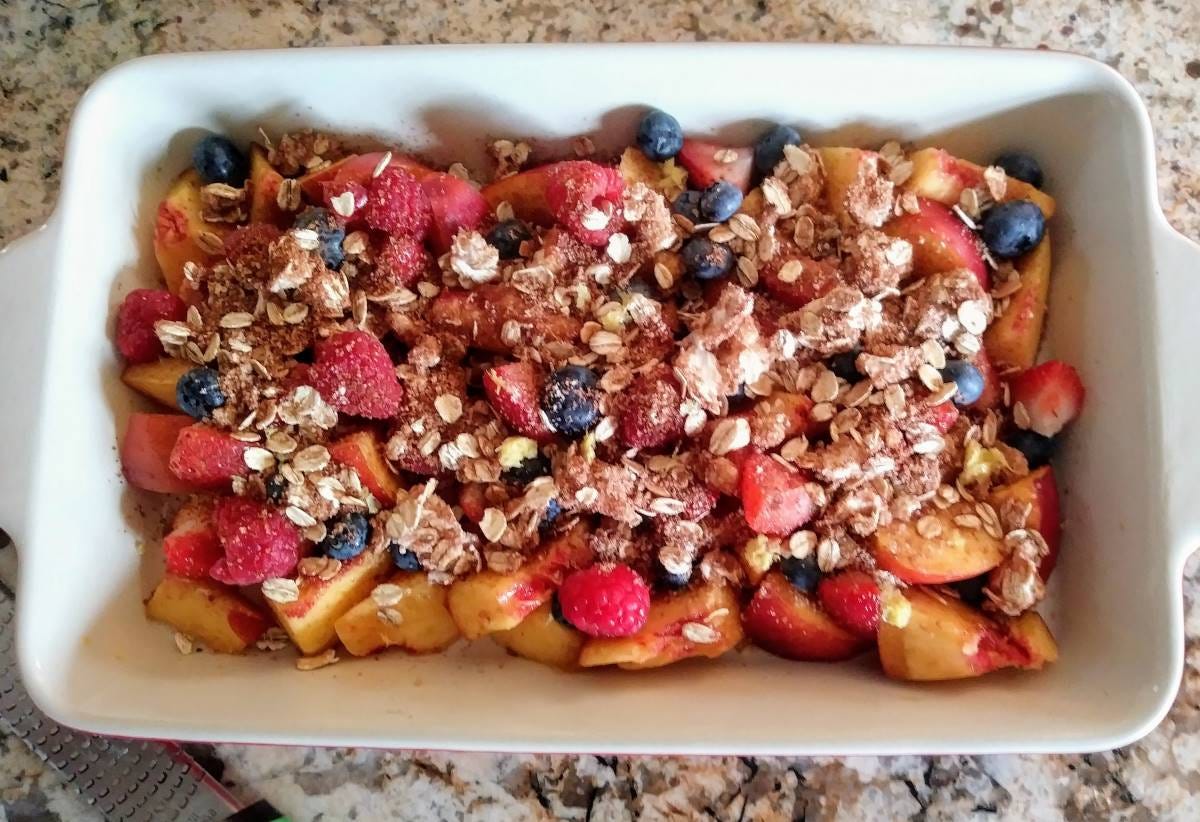 Triple Berry Nectarine Crisp in baking pan.